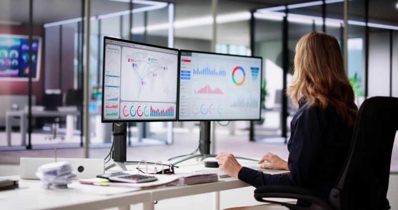 KPI Business Analytics Data Dashboard. Analyst Using Computer
